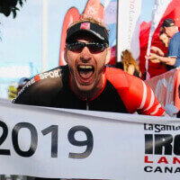 Michael at the Ironman finish line